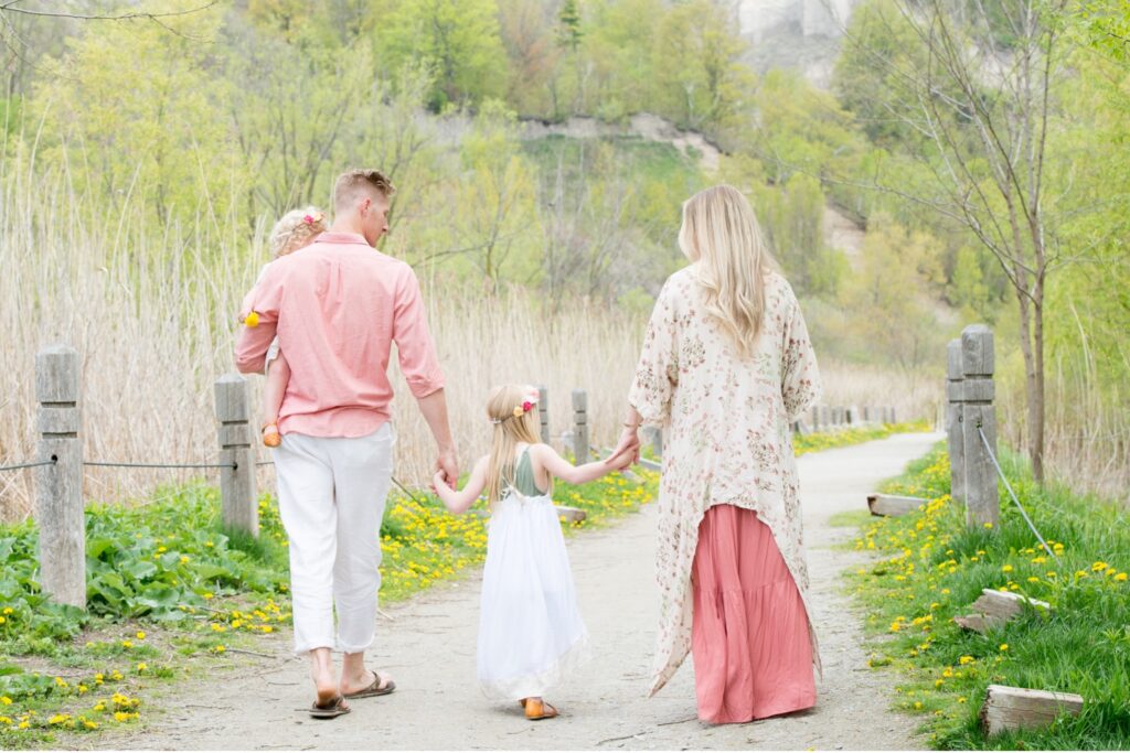 family walking on a trail
