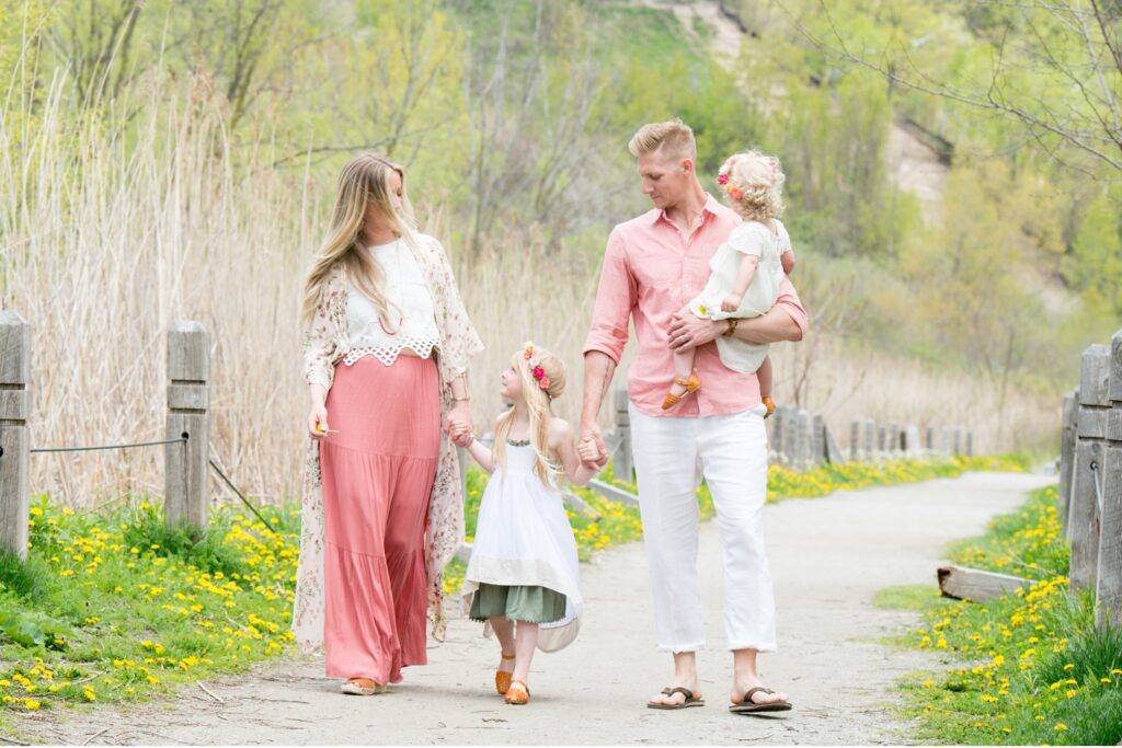 family walking on a trail