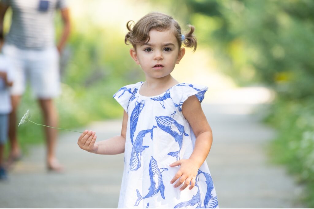little girl on a trail