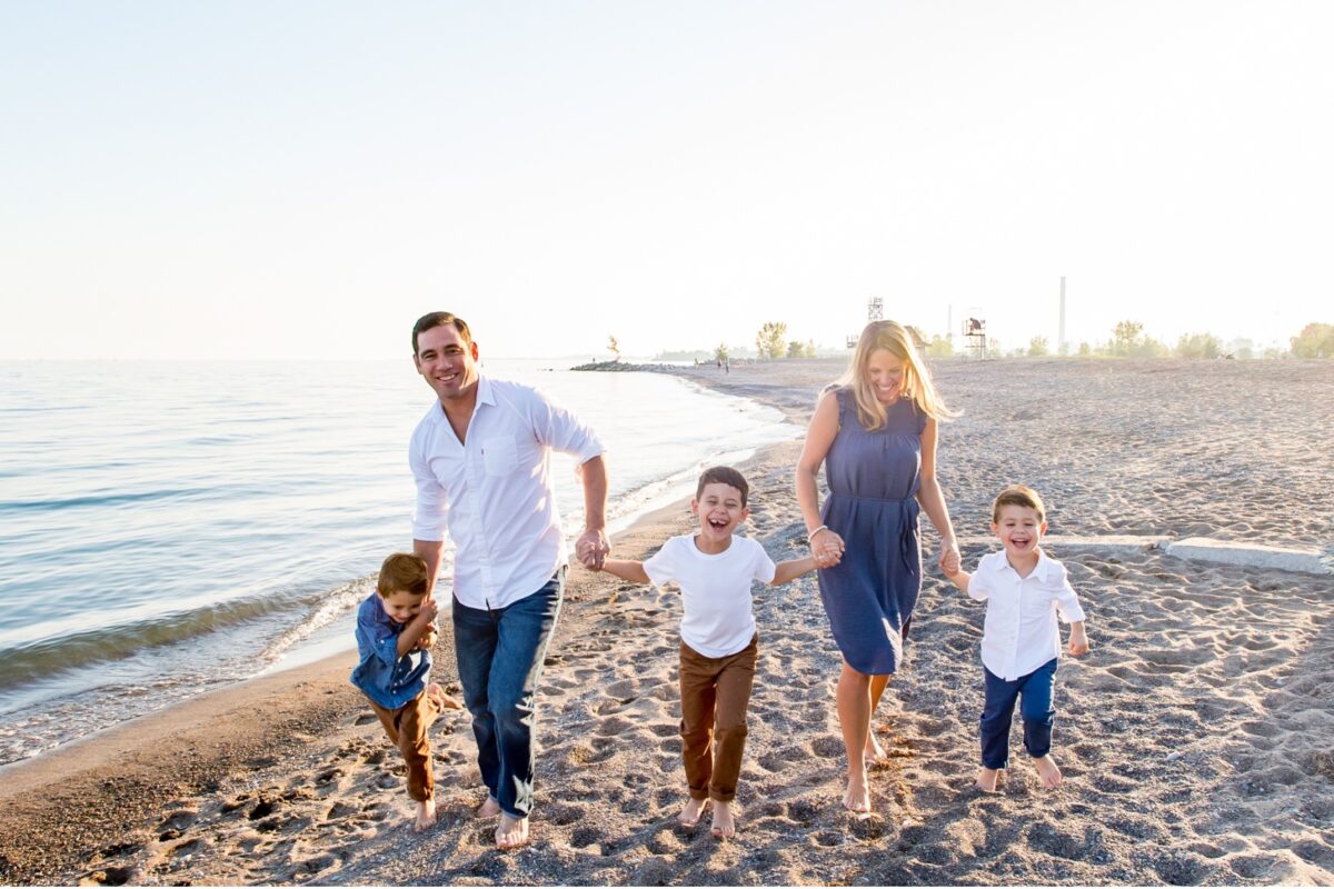 family walking on the beach